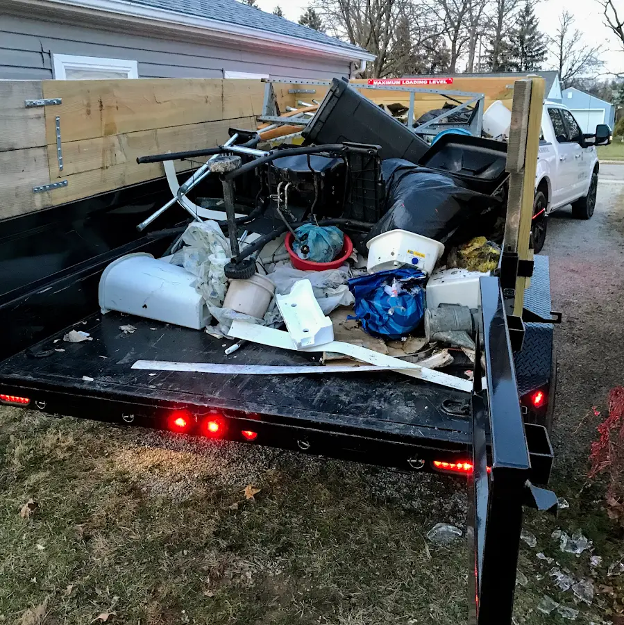 Roll-off dumpster delivered to a residential driveway in Cambria